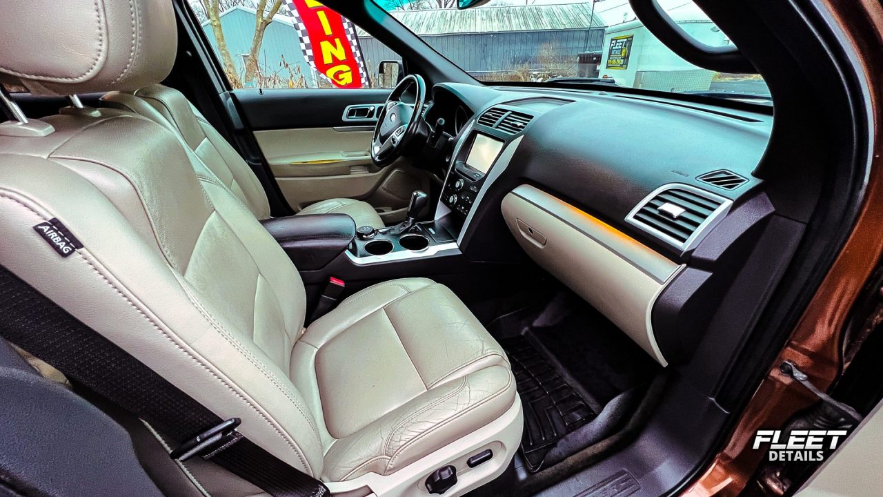 Orange Ford Explorer managed by Fleet Details in Rockford, IL