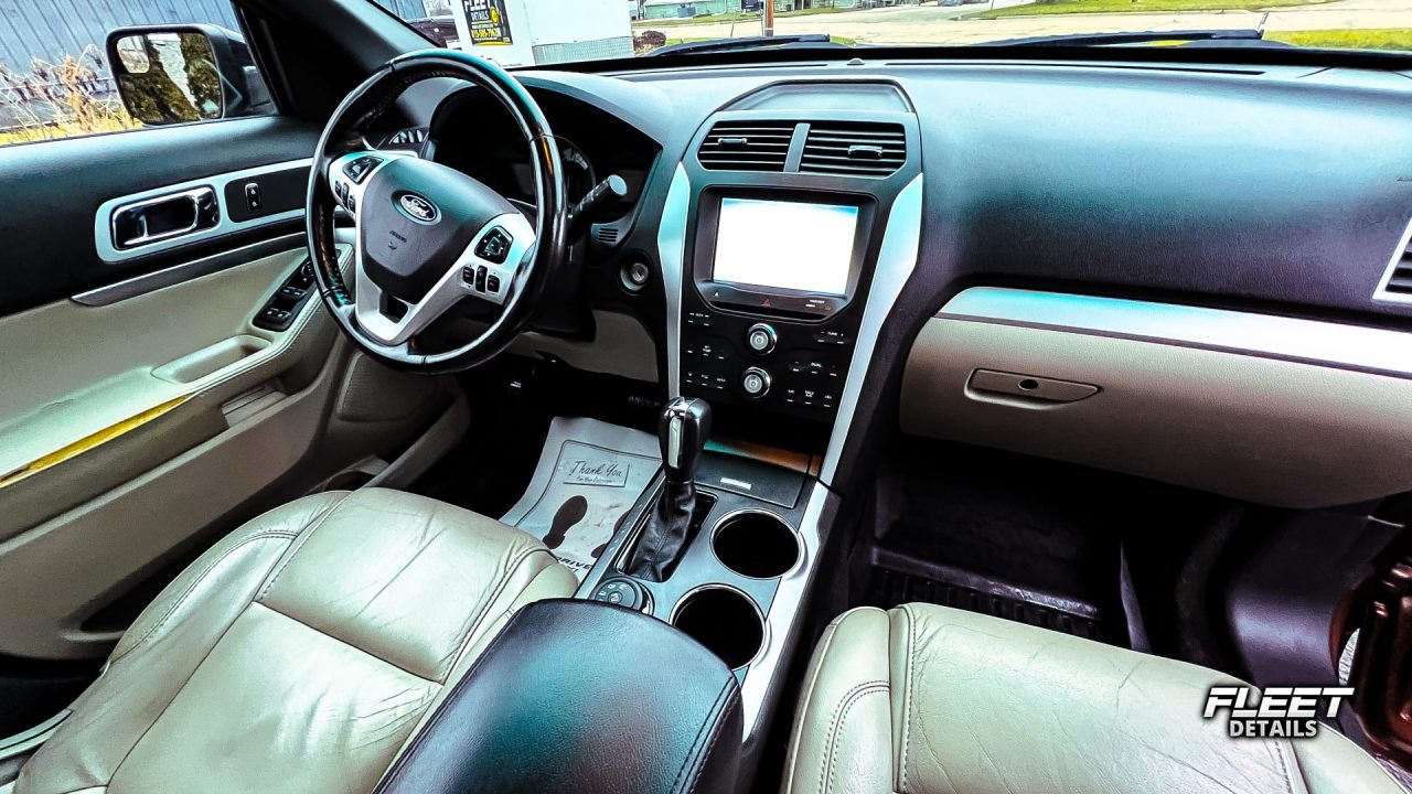 Pristine Orange Ford Explorer touch from Fleet Details