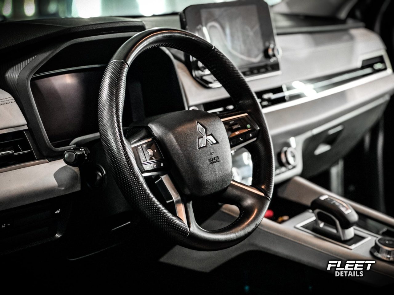 Grey Mitsubishi Outlander finished by Fleet Details in Rockford, IL