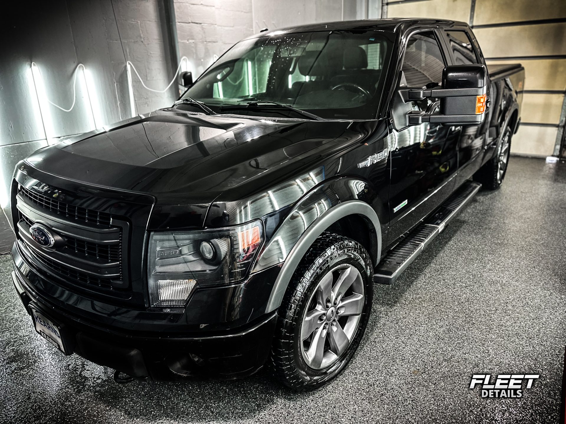 A deep surface achieved with Black Ford F-150 by Fleet Details in Rockford