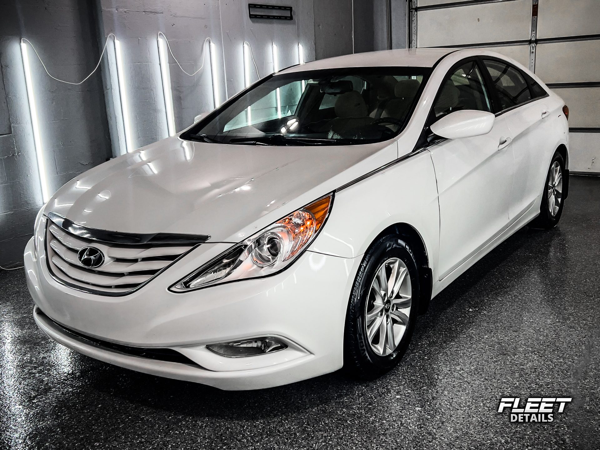 Top-quality White Hyundai Sedan vehicle care by Fleet Details - Rockford, IL