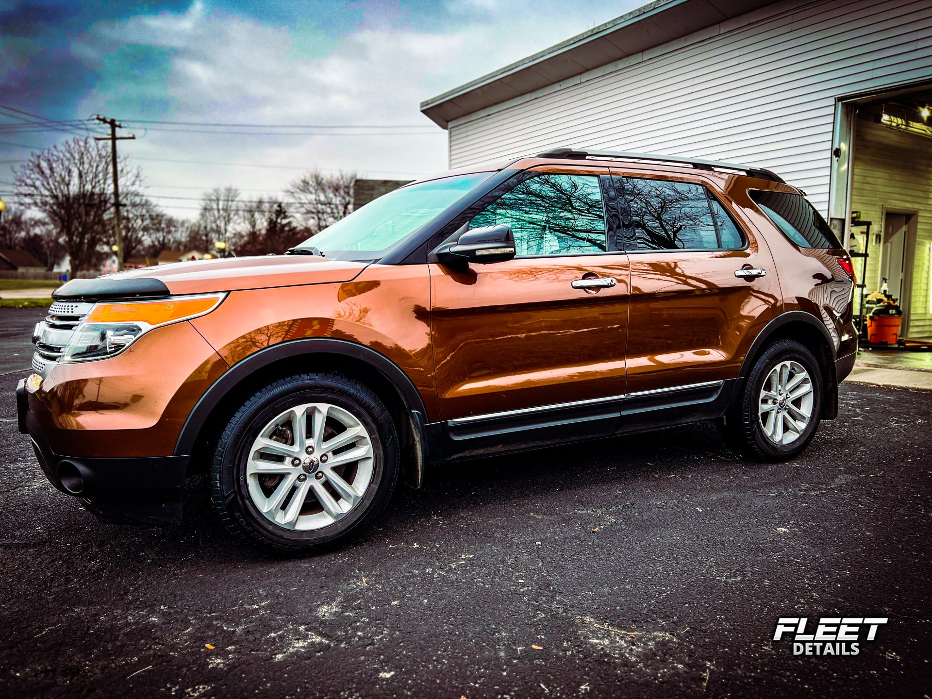 Orange Ford Explorer renewal - finished work by Fleet Details in Rockford