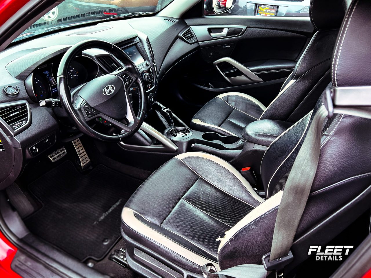 Licensed Red Hyundai Veloster from Fleet Details