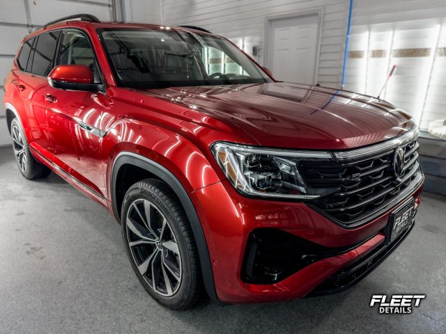 A vehicle receiving a professional ceramic coating by Fleet Details in Rockford, IL. Our ceramic coating services provide unmatched protection against scratches, UV damage, and environmental contaminants, ensuring a long-lasting glossy finish. Contact us for expert ceramic coating near you.